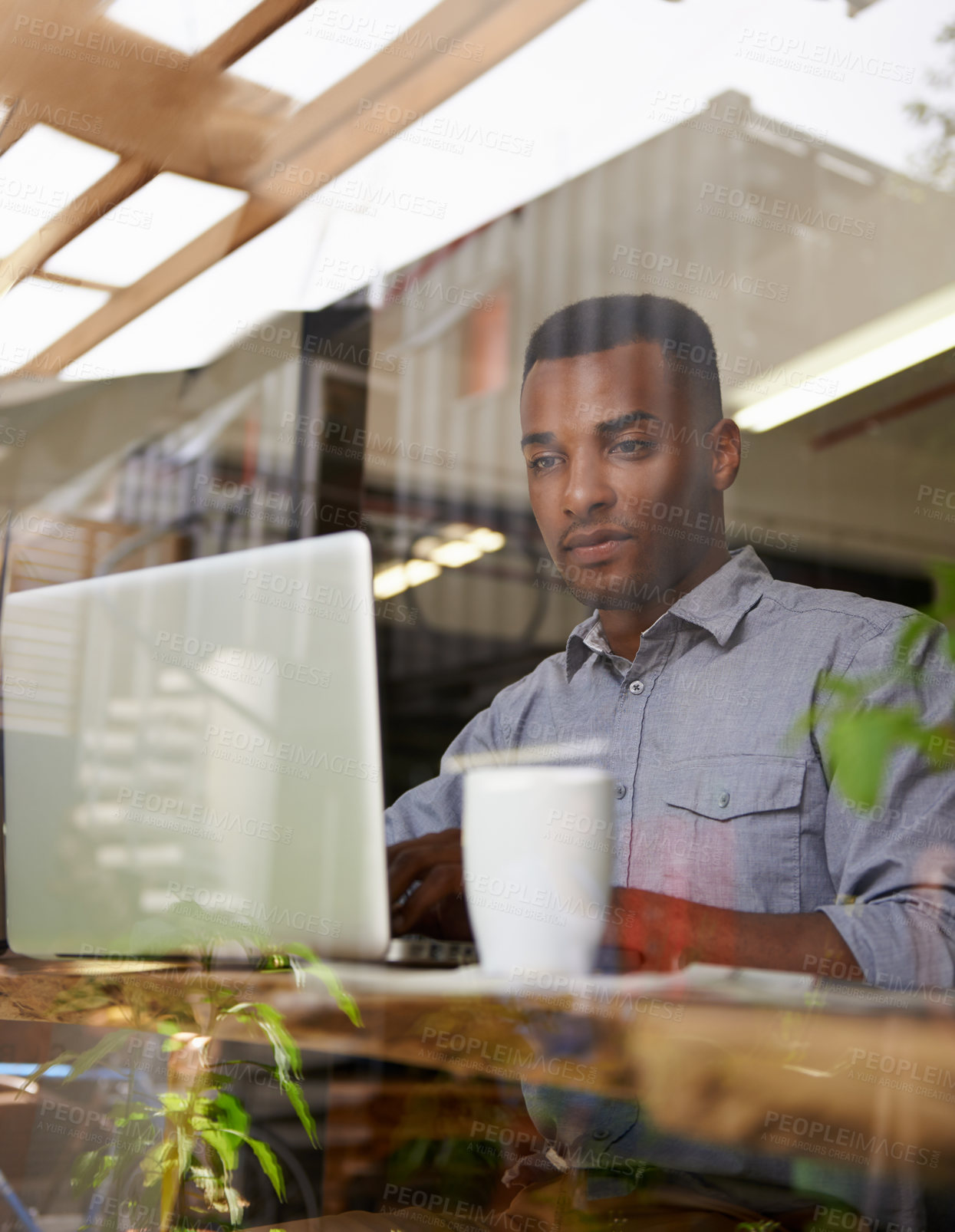 Buy stock photo African man, laptop and writing for reading, search and typing for work with coffee in workspace. Self-employed, freelance and male person with computer for internet, browsing and communication