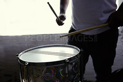 Buy stock photo Cropped shot of a man beating his drum