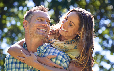 Buy stock photo Romance, embrace and couple with smile in park for summer weekend, trees and fun outdoor date. Love, mature man and happy woman in garden with morning sunshine, hug and marriage bonding in nature.