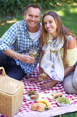 Buy stock photo Portrait, picnic and couple with date, marriage and happiness with romance or Valentines day with wine. Outdoor, man or woman with alcohol, relationship or anniversary with celebration, love or smile