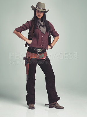 Buy stock photo Woman, fashion and cowboy clothes with portrait in studio, western character and costume on white background. Wild west style, outlaw cosplay and vintage apparel with confidence and aesthetic