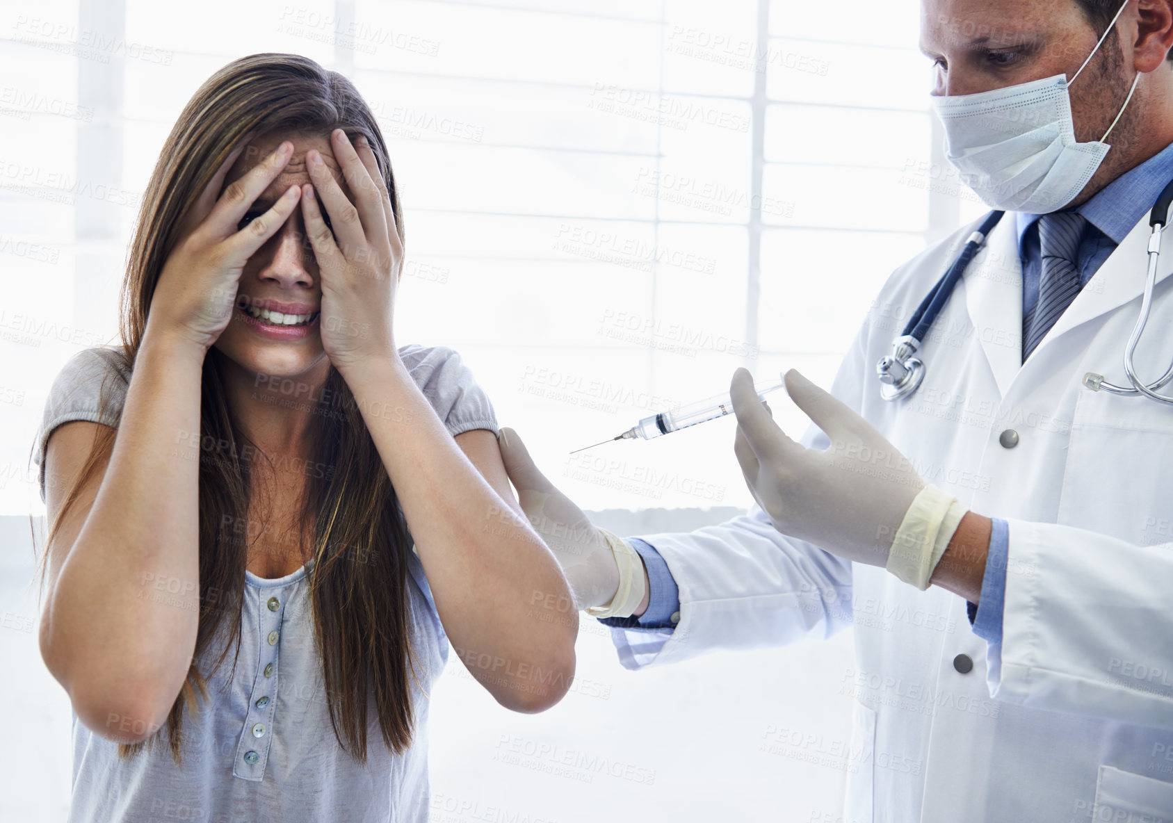 Buy stock photo A doctor giving a woman an injection