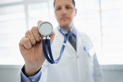 Buy stock photo Man, doctor and stethoscope for cardiology consultation or heart rate listening for healthcare, wellness or treatment. Male person, equipment and monitor for medical service, diagnosis or examination