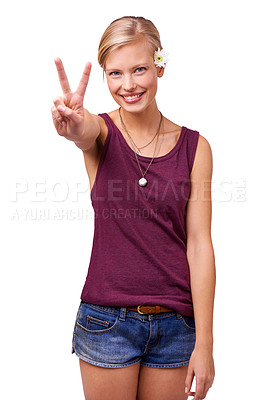 Buy stock photo Studio portrait of an attractive young woman giving the peace sign isolated on white