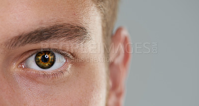 Buy stock photo Close-up of a man's eye with a clock inside