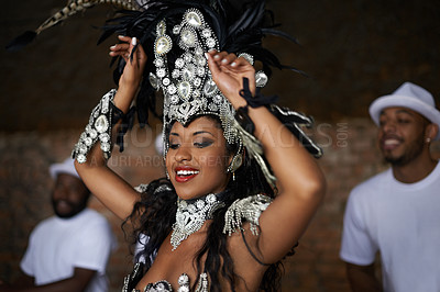Buy stock photo Woman, dancer and samba performance at night for celebration in Rio de janeiro for carnival season. Female person, costume and feathers for culture and life, creativity and confidence at festival