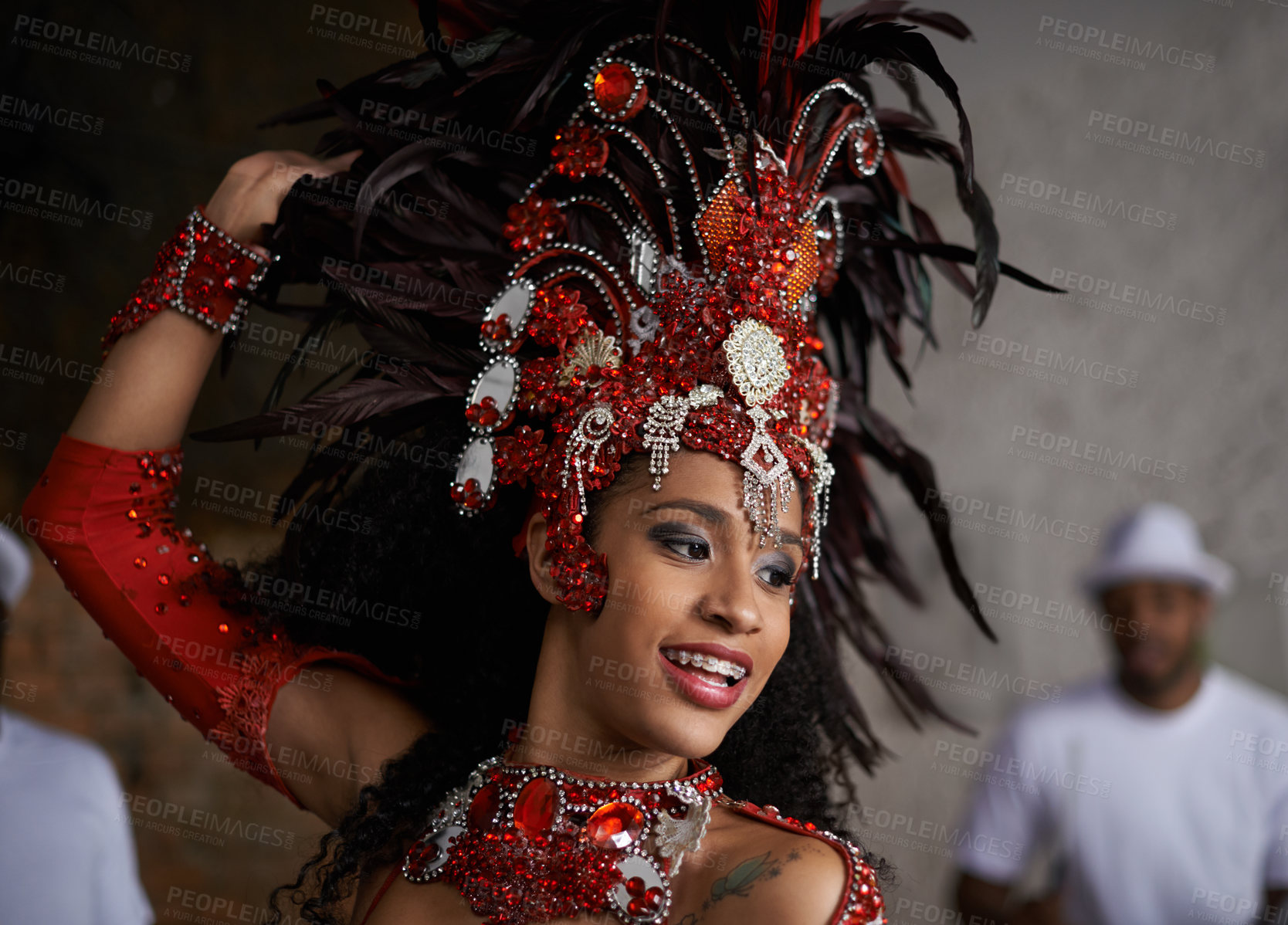 Buy stock photo Shot of a beautiful samba dancer performing in a carnival with her band