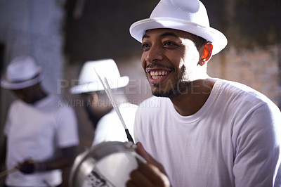 Buy stock photo Live music, smile and man with percussion instrument and band mates on stage in South Africa. Happy black person, drummer and musician for playing, singing and dancing in night club performance