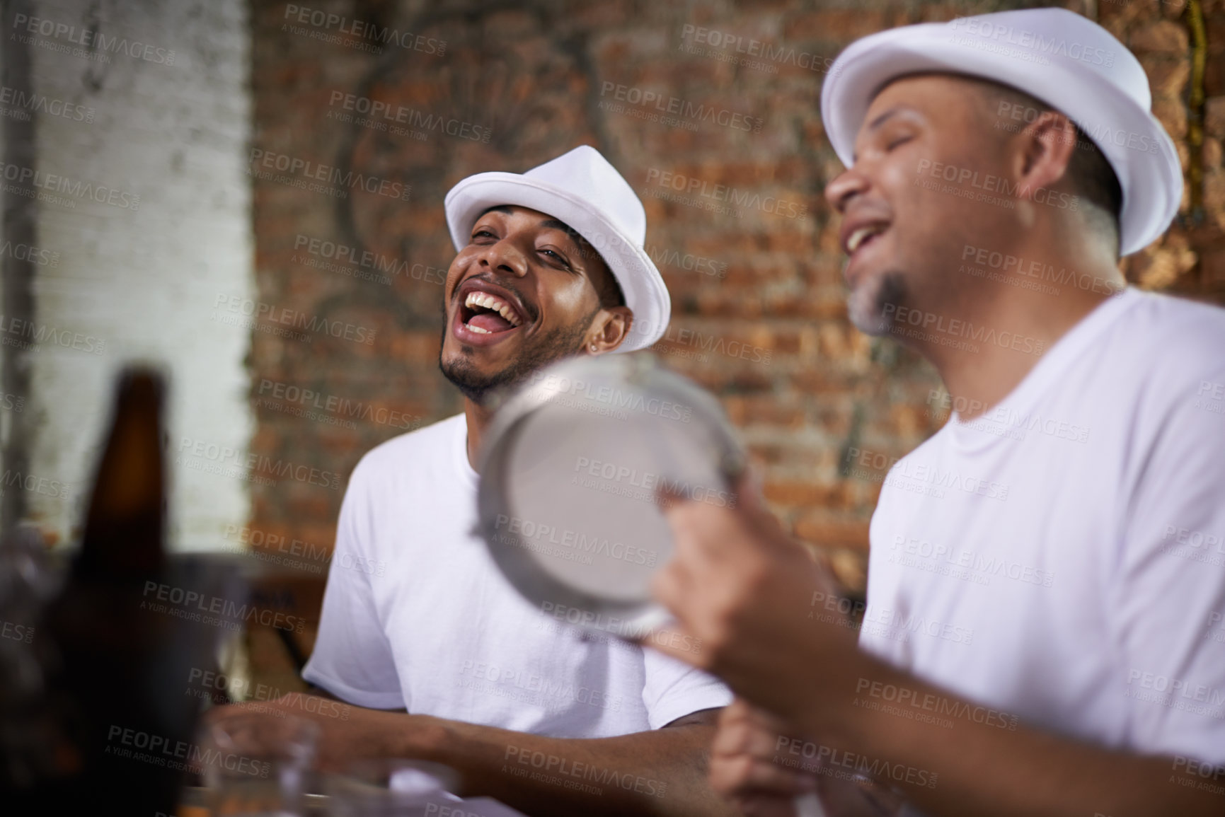 Buy stock photo Happy man, band and percussion with music for performance, audition or singing at musical event. Male person or group of musicians playing instruments for sound or fun local entertainment at concert