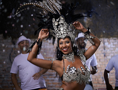 Buy stock photo Night, woman and dancer with band at carnival in rio de janeiro for brazilian festival with feather costume or smile. Person, face and happy with samba, fashion and music for culture or outdoor event