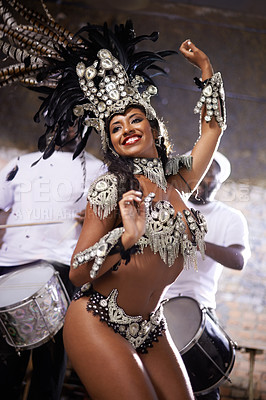 Buy stock photo Carnival, dancing and woman for performance in Brazil, dancer with gemstone outfit and feather head gear outdoor. Music, samba and happiness for event, culture with festival entertainment and talent