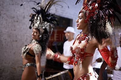 Buy stock photo Women, dancer and samba for carnival and music festival or night performance with costume and band. Group, dancing and drums for event, celebration and culture or history in Rio de Janeiro, Brazil