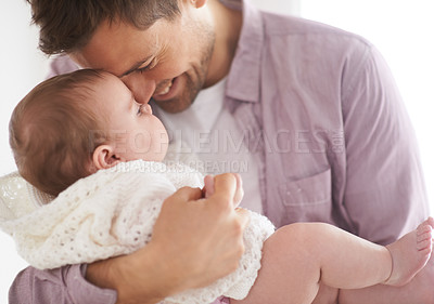 Buy stock photo Baby, girl and dad holding with smile, proud and fathers day in family home. Parents, infant and love embrace for eskimo kiss, growth and healthy child development in nursery for affection parenting 