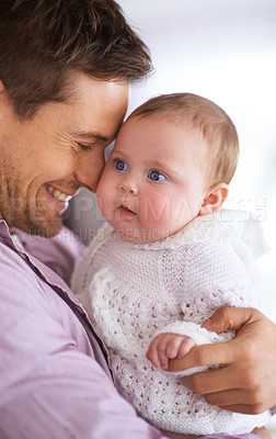 Buy stock photo Dad, hug and baby with love, support and care for family, bonding and paternity at home. Happy father, parent or man playing with his newborn child for affection, development and excited for growth