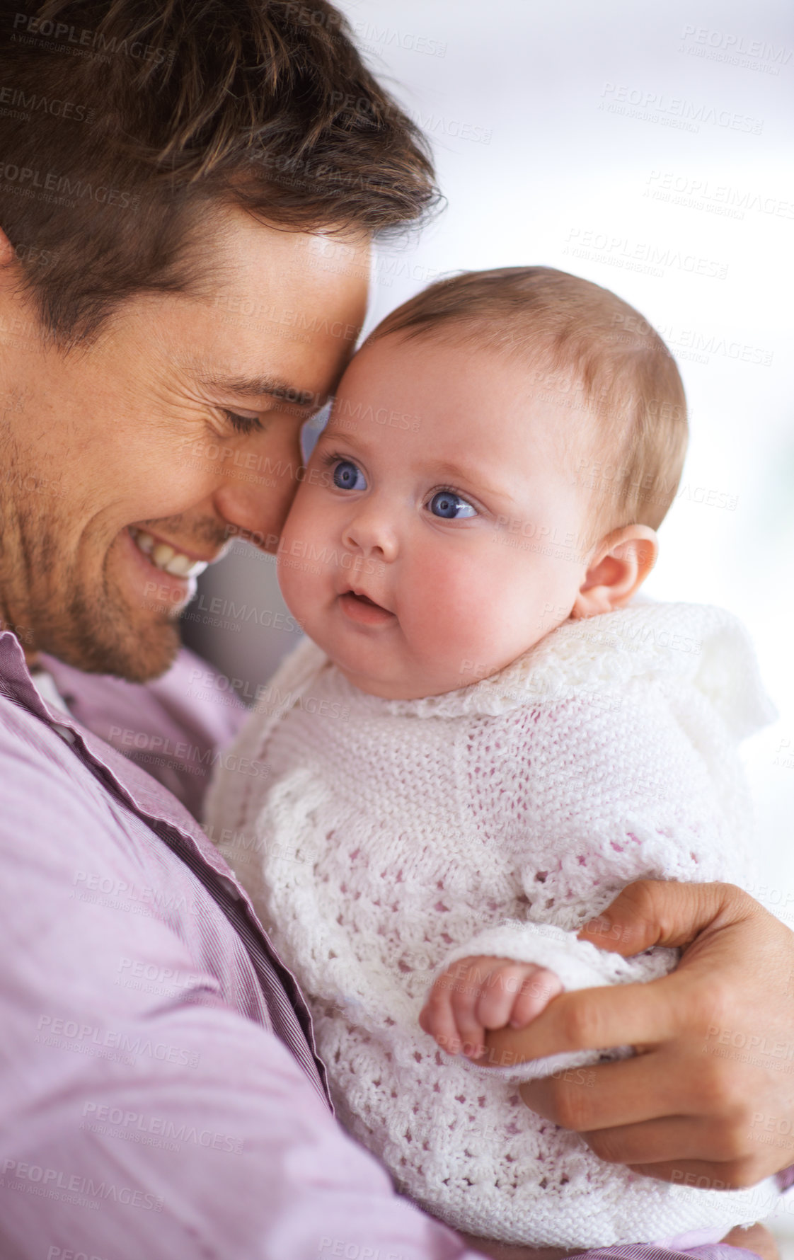 Buy stock photo Dad, hug and baby with love, support and care for family, bonding and paternity at home. Happy father, parent or man playing with his newborn child for affection, development and excited for growth