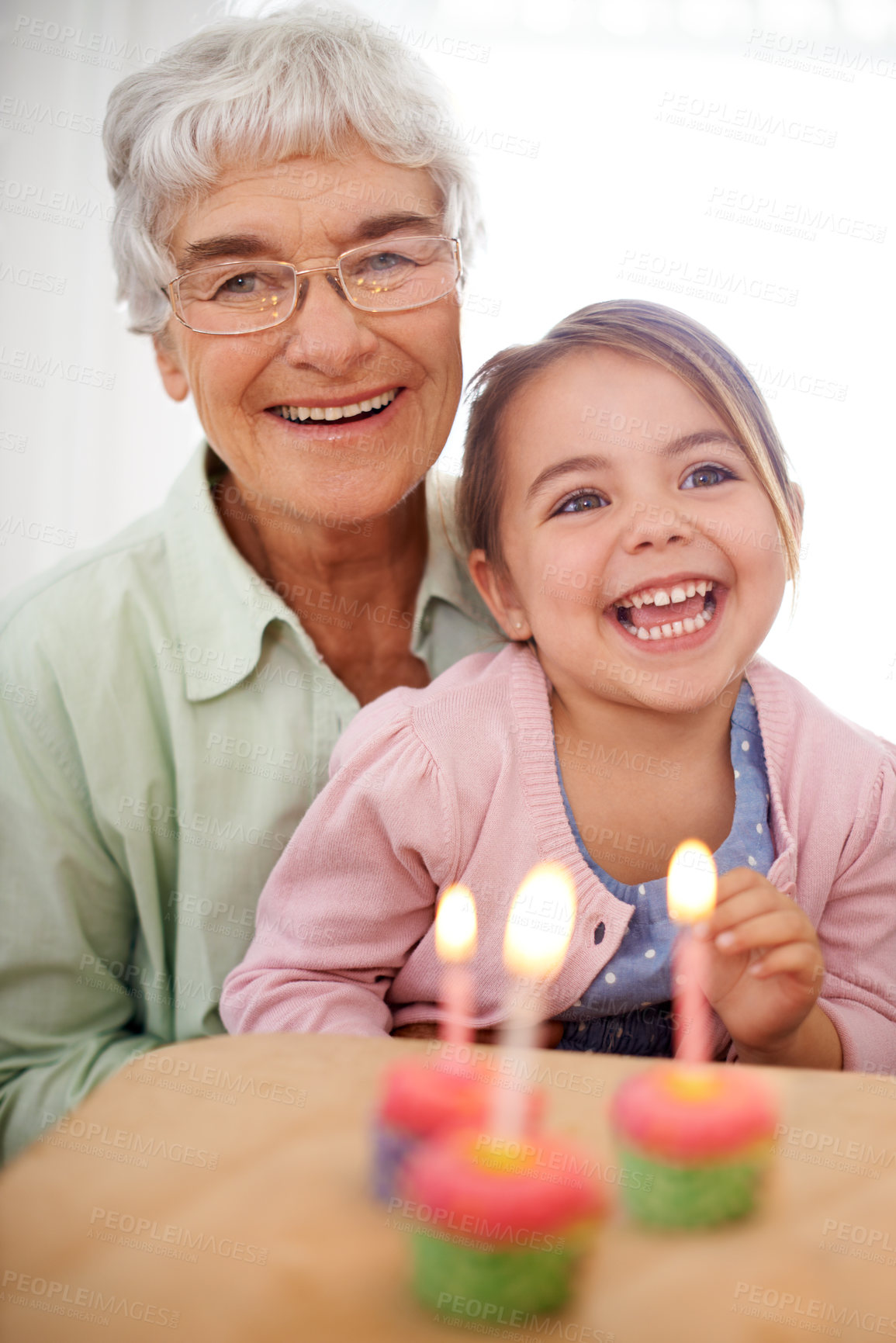 Buy stock photo Cupcakes, child and granny with birthday, girl and laugh with happiness, candy and cheerful kid. Grandmother, celebration or excited with dessert or portrait with party or box with wow, sweet or home