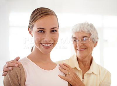 Buy stock photo Elderly mom, daughter and portrait with hug, pride and care for love, bonding and reunion in family home. People, senior mom and women with celebration for mothers day, connection and smile in house