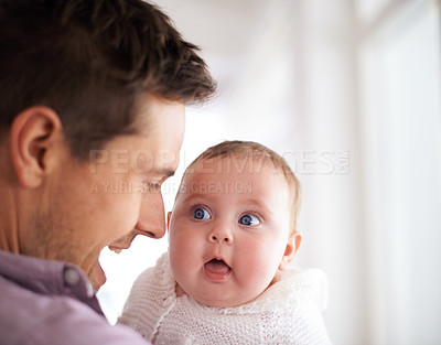 Buy stock photo Love, father and baby with face in home for bonding, comfort and playing together for healthy development. Family, man and newborn child with smile, embrace and relax for parenting, care and security