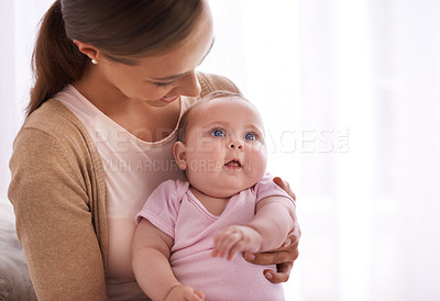 Buy stock photo Mom, hug and baby with love, support and care for family, bonding and maternity at home. Happy mother, parent or woman playing with her newborn child or infant for development, excited and growth