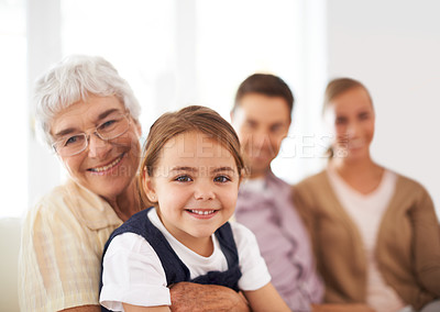 Buy stock photo Portrait, family and happy kid with grandmother in home for bonding, love or care together with parents. Face, grandma and girl child with mother and father in living room with smile for connection