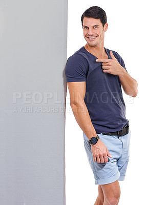 Buy stock photo Man, pointing at poster mockup and advertising sign, portrait with announcement or news on white background. Billboard, banner and signage with information, communication and about us promotion