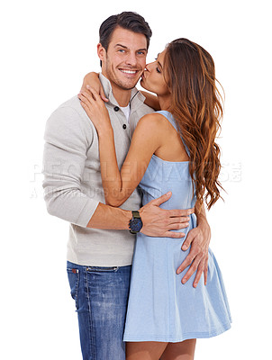 Buy stock photo Couple, hug and kiss in studio with happiness for romance, bonding or honeymoon date with affection. Marriage, man and woman with embrace, care or smile for anniversary commitment on white background