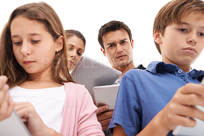 Buy stock photo Mother, father and children with tablet on a white background for internet, website or online games. Family, ignore and mom, dad and kids on digital tech for streaming, connection or videos in studio