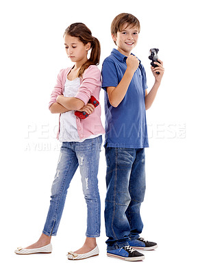 Buy stock photo Children, siblings and winner with loser for video games, competition or esports on a white studio background. Boy and girl with smile and disappointment for gaming victory or loss on mockup space