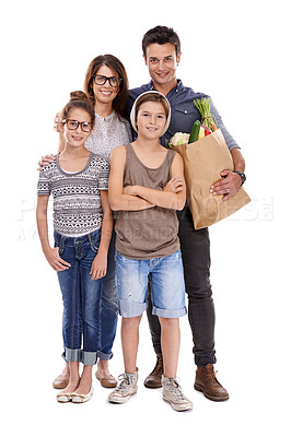 Buy stock photo Happy family, portrait and shopping bag with vegetables for food, natural sustainability or nutrition on a white studio background. Mother, father and children with smile for ingredients or groceries