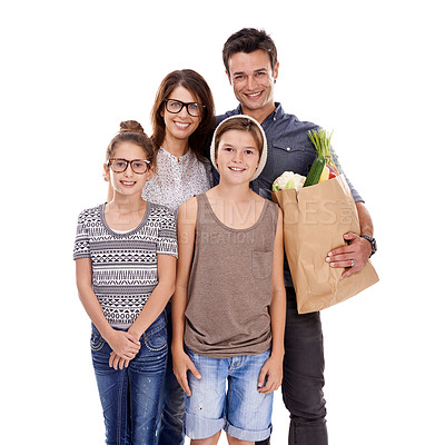 Buy stock photo Happy family, portrait and bag with groceries for natural sustainability in fashion on a white studio background. Mother, father and children with smile for food shopping in casual clothing on mockup