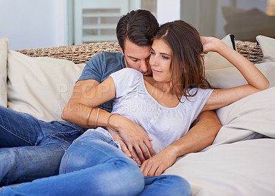 Buy stock photo Happy couple, relax and hug on sofa for holiday connection in Florida for bonding vacation, resting or marriage. Man, woman and embrace on comfortable couch for together commitment, love or safety