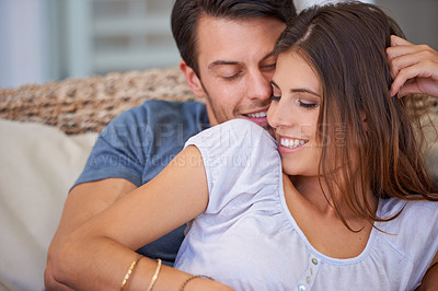 Buy stock photo Happy couple, connection and hug on sofa for relax holiday in Florida for bonding vacation, resting or marriage. Man, woman and embrace on comfortable couch for together commitment, love or morning