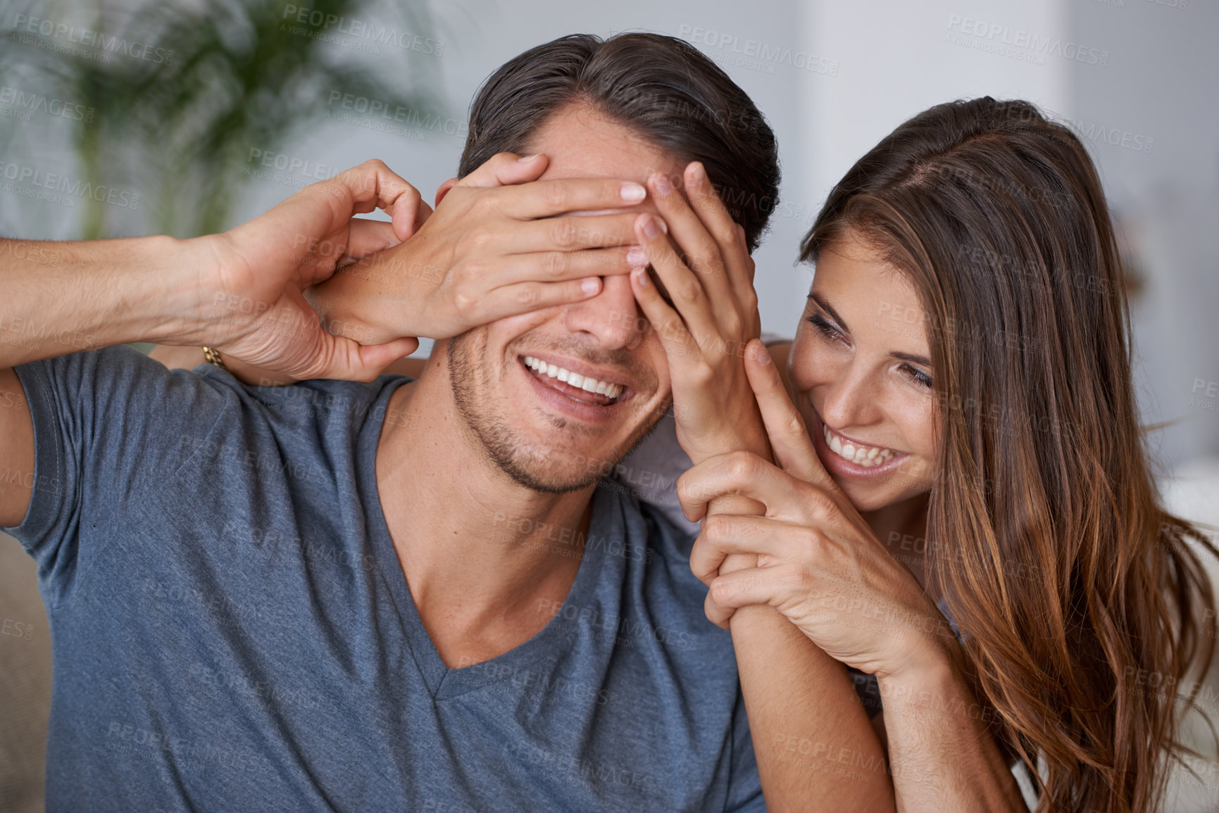 Buy stock photo Covering eyes, couple and happy surprise in living room or woman with partner, hands cover face and hide reveal. Girlfriend, man and love or playing together, guess who or excited announcement