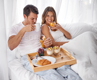 Buy stock photo Breakfast, bed and couple portrait with love, care and morning food together at home. Happiness, smile and relax young people eating and drinking in a house for anniversary or valentines day