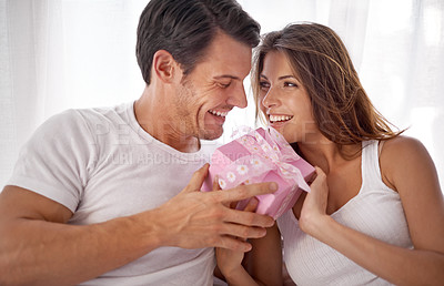 Buy stock photo Man, woman with gift box and smile, love and happiness with partnership, relationship and celebration on Valentines day. Couple with present, luxury and commitment, gratitude and celebrate holiday