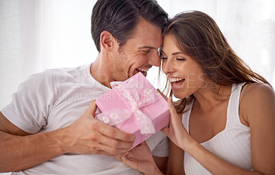 Buy stock photo Man giving woman gift, love and happiness with partnership, relationship and celebration on Valentines day date. Couple laugh with present, luxury and commitment, gratitude and celebrate holiday