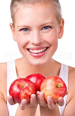 Buy stock photo Portrait of a beautiful young woman holding apples in her hands
