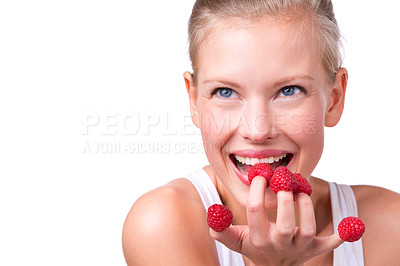 Buy stock photo Healthy, playful and woman eating raspberries, fingers and wellness isolated on white studio background. Person, mockup space or model with fruit and funny with nutrition, fresh or happiness with joy