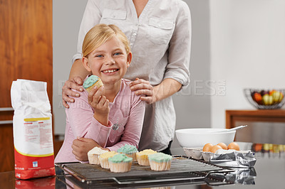 Buy stock photo Mother, hands or portrait of child baking in kitchen or happy family with girl learning cupcake recipe. Love, daughter or mom in home with muffin or smile for helping or teaching kid for development
