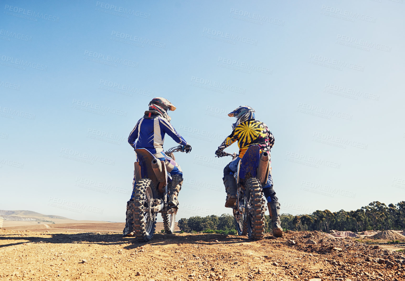 Buy stock photo Rear view, sport or people on motorcycle outdoor on dirt road with relax after driving, challenge and competition. Sports, motorbike and dirtbike driver with helmet on offroad and path for racing
