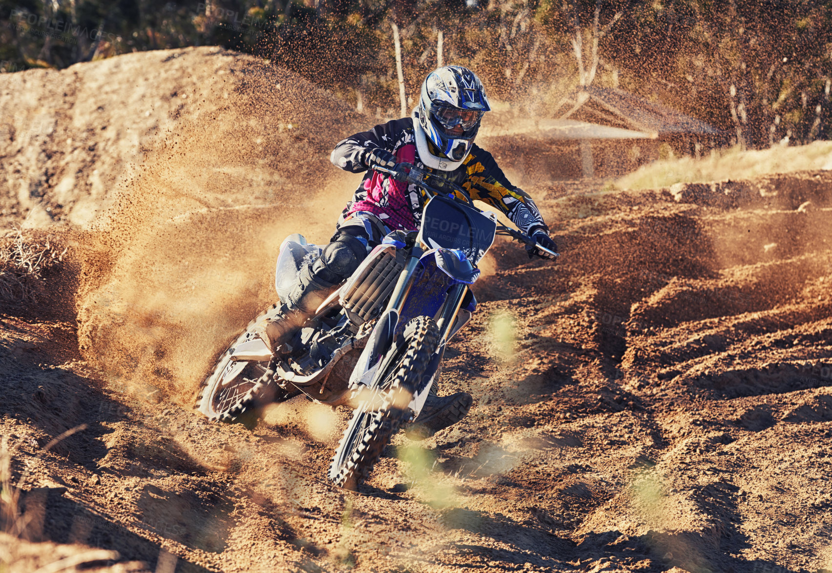 Buy stock photo Person, dirt track and professional motorcyclist on bike for extreme sports, competition or outdoor race. Expert rider on motorbike or scrambler for sand course, challenge or off road rally in nature