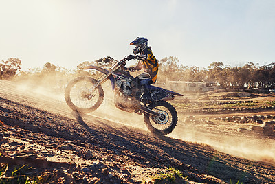 Buy stock photo Hill, race and man on dirt bike in desert with adventure, adrenaline and speed in competition, Extreme sport, dust and athlete on off road motorcycle for challenge, power or danger on action course