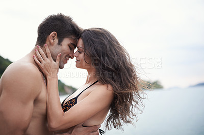 Buy stock photo Couple, touch and travel to ocean on vacation, love and relax by water on summer holiday. People, swimwear and bonding for relationship in outdoors, support and hug on weekend trip to sea or nature