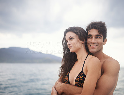 Buy stock photo Couple, embrace and travel to ocean on holiday, love and relax by water on adventure. Happy people, peace and bonding for relationship in outdoors, support and hug on weekend trip to sea or nature