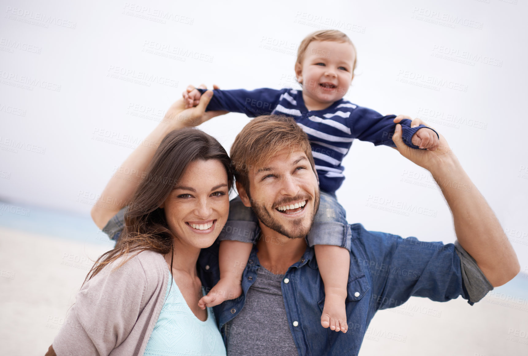 Buy stock photo Family, airplane and baby with parents at a beach for piggyback, fun and walking in nature. Love, kid and happy woman with man outdoors bonding, smile and relax while enjoying travel, freedom or game