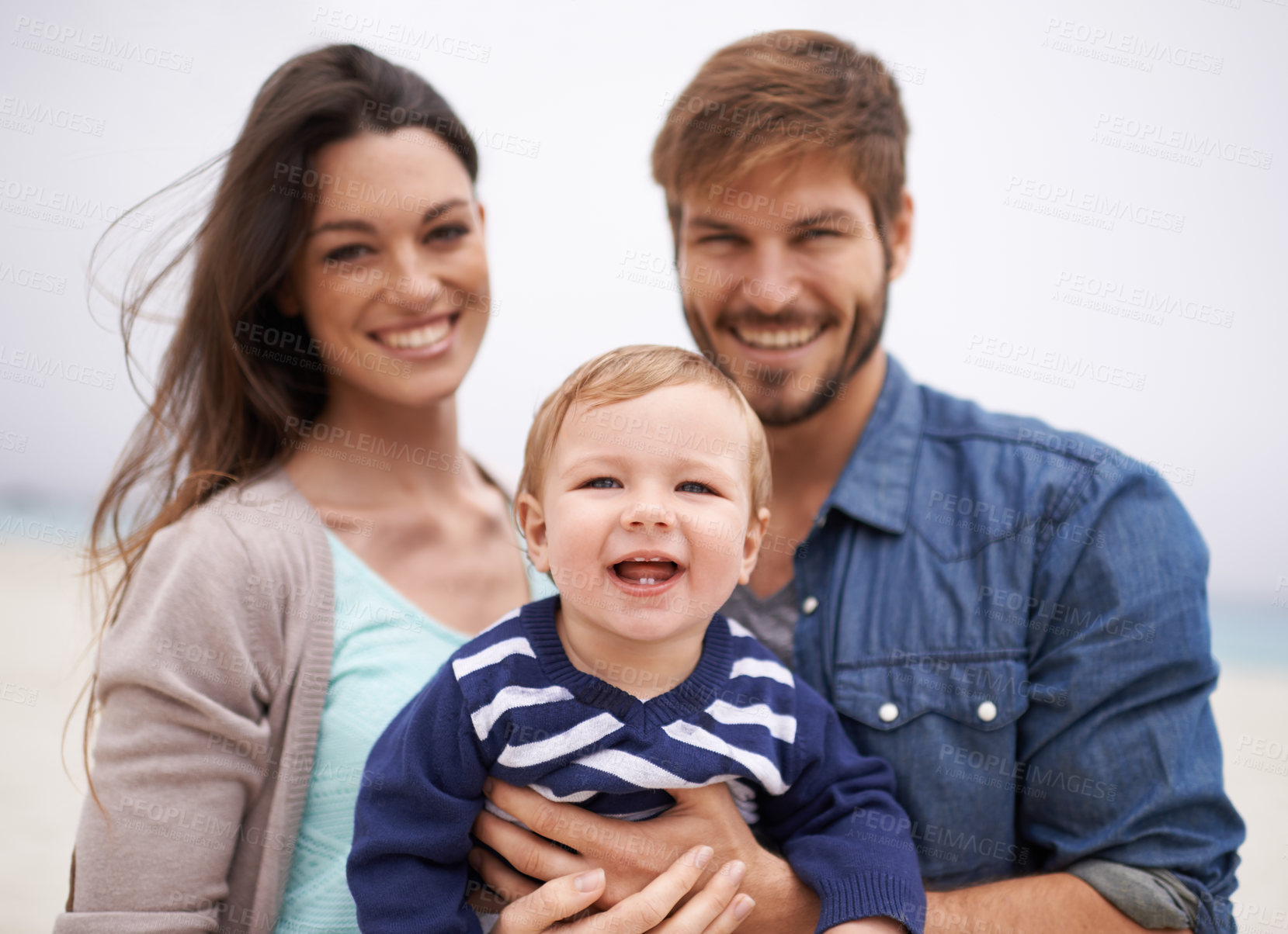 Buy stock photo Mother, father and portrait with toddler at beach for family, love and adventure together on vacation. Happy, man and woman with baby by ocean for support, travel and relaxing holiday in Los Angeles