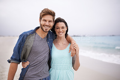 Buy stock photo Portrait, couple and hug at beach for travel, romance and freedom while walking together outdoors. Love, face and happy woman embracing man on trip, vacation or holiday, bond or having fun in Florida