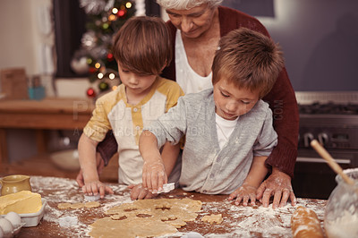 Buy stock photo Learning, grandma and children in kitchen baking dessert or pastry. Education, kids and grandmother with cookie dough on table for quality time together in house or holiday, vacation and celebration.