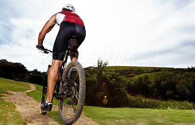 Buy stock photo Fitness, bike and man cycling in countryside for training, cardio or adventure on off road path. Exercise, sports and wellness with cyclist person in nature for health, workout or challenge from back