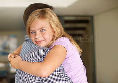 Buy stock photo Family, hug and dad with portrait of girl, relaxing and holding parent for comfort. Smile, happy or fathers day and carrying young child inside home, loving embrace or bonding together in household